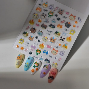 Cute cat themed nail stickers with paw prints and ice cream patterns in macaque colors
