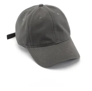 Top view of dark grey cotton baseball cap showing six-panel crown and top button