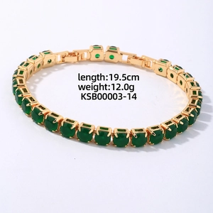 Detail of gold tennis bracelet with green round-cut stones and clasp specifications