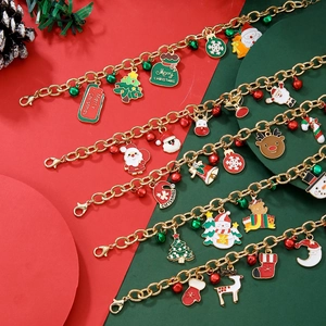 Christmas charm bracelet with Santa, reindeer and bells on gold chain jewelry