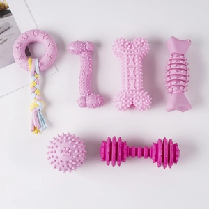 Details von 6 pinkfarbenen Kauspielzeugen aus Gummi mit Noppen zur Zahnpflege für Hunde