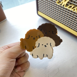 Three cute cartoon puppy hair claws in acetate with brown and beige poodle designs