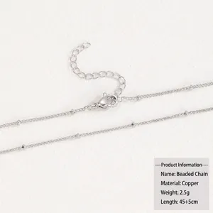 Close-up of 18k silver plated copper bead chain with lobster clasp and extension