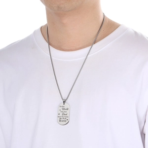 Male model wearing silver military tag necklace with To the World You Are Dad engraving