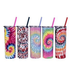 Five tie-dye double-walled stainless steel skinny tumblers with straws on white background