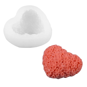 Detailed texture of 3D heart silicone mold and finished pink floral textured candle