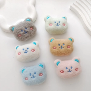 Plush cartoon bear brooches set in six pastel colors on a clean white background