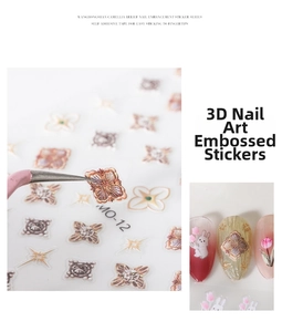 Macro detail of 5D embossed nail stickers featuring vintage tulip and rabbit patterns