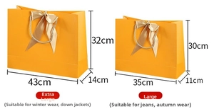 Detailed size chart for orange gift bags with gold bow handles in two various dimensions