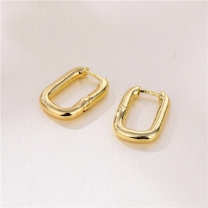 Minimalist gold-plated brass U-shaped geometric oval earrings with polished finish