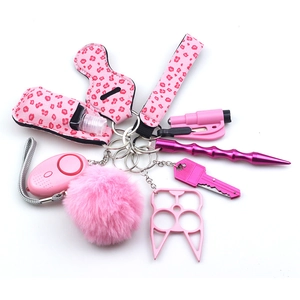 Pink leopard print self-defense keychain set with wristlet and personal safety alarm