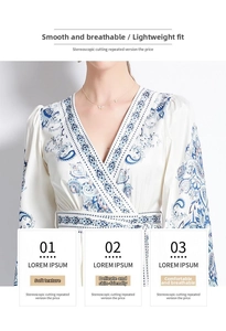 Detail view of ethnic V-neck print dress showing smooth fabric and paisley patterns