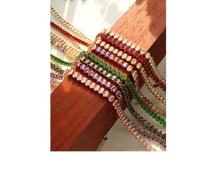 Close-up of elegant multicolor tennis bracelets with gold-plated zircon settings