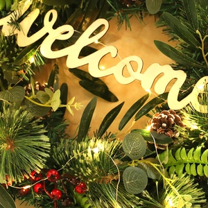Christmas olive branch and pine needle wreath with red berries, LED lights and Welcome sign