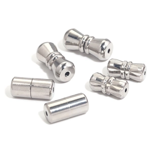 Detailed macro view of polished stainless steel screw clasps for jewelry making