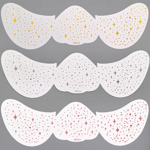 Detailed view of K92012 freckle tattoo stickers in gold, silver and pink star patterns