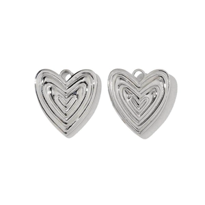 Detailed view of 3D layered heart-shaped stainless steel charms for DIY jewelry making