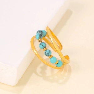 Exquisite gold multi-layer open ring with turquoise beads in a vintage Egyptian style