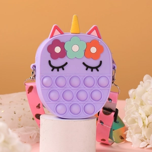 Purple unicorn silicone crossbody bag with pop-fidget bubbles and floral strap
