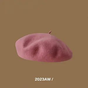 Detailed texture of dusty rose Australian wool beret with retro classic top stalk