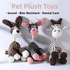 Detailed view of plush pet toys in corduroy fabric with braided rope and squeaker