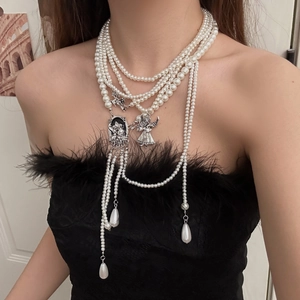 Vintage multi-layer pearl necklace with angel pendants and embossed queen coin charms