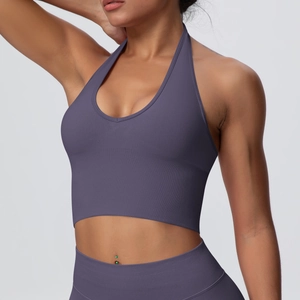 Close-up of mauve ribbed knit fabric and halter neck design on high-impact sports bra