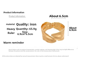 Detailed view of wide gold irregular textured metal bangle with size and weight specs