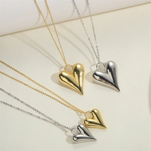 Colliers avec pendentif coeur bombé plaqué or 14K en finitions or et argent