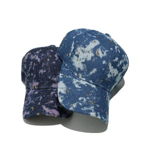 Denim baseball caps with gradient dye and gold embroidered star and moon patterns