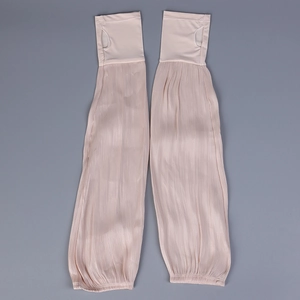 Detail of shimmer pleated sun protection sleeves with finger holes and elastic cuffs