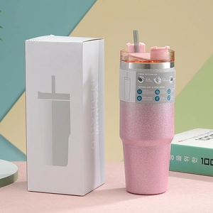 Pink glitter 30oz tumbler showing 3-way lid design and vacuum insulated box packaging