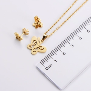 Golden stainless steel necklace and earrings set featuring hollow butterfly design with ruler