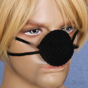 Close-up of handmade black crochet nose warmer protector on a mannequin head