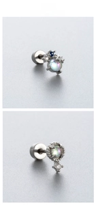 Detail view of titanium steel moonstone earrings with screw backs and star charm