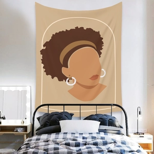 Detail showing bohemian tapestry with minimalist African woman silhouette in bedroom decor