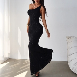 Detail of elegant black one-shoulder evening gown with shimmering sequins and mermaid hem