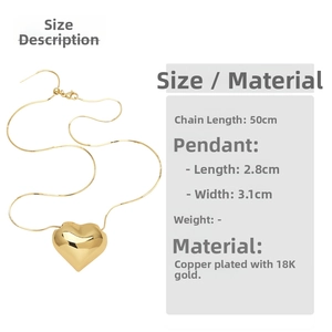 Detail view of heart pendant with dimensions 3.1x2.8cm and 50cm gold plated chain