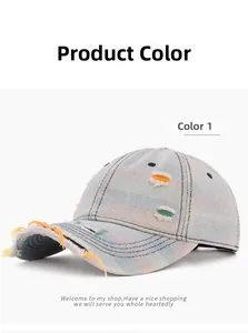 Close-up of light blue distressed denim baseball cap with colorful frayed rainbow details