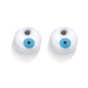 Detail of round white evil eye charms for DIY jewelry making with blue enamel finish