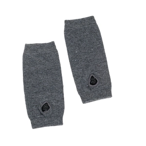 Detail of dark grey striped knitted arm warmers with thumb holes and ribbed cuffs
