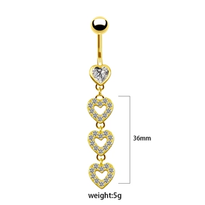 Macro shot of gold belly ring featuring four hearts with zircon stones and 36mm length