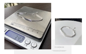 Detailed macro view of silver box chain bracelet with curved plate showing 3.42g weight