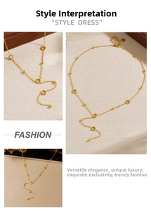 Detail of gold-plated Y-shaped necklace with hollow floral pendant and bead chain