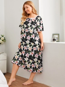 Detailed square neckline with delicate white lace trim and black bow on floral nightgown