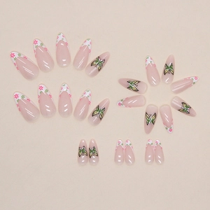 Almond-shaped press-on nails with French floral tips and butterfly art patterns