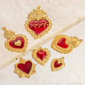 Gothic 18K gold sacred heart pendants with vintage red enamel and baroque flames