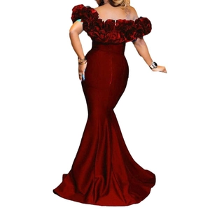 Back view of a burgundy velvet off-shoulder mermaid dress with a sleek tail design