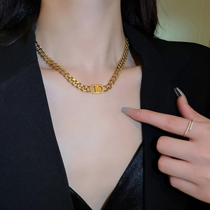 Elegant gold-tone stainless steel thick chain necklace with iconic CD logo pendant for women