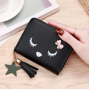 Black mini zipper wallet with cartoon cat pattern, tassel fringe, and star pendant